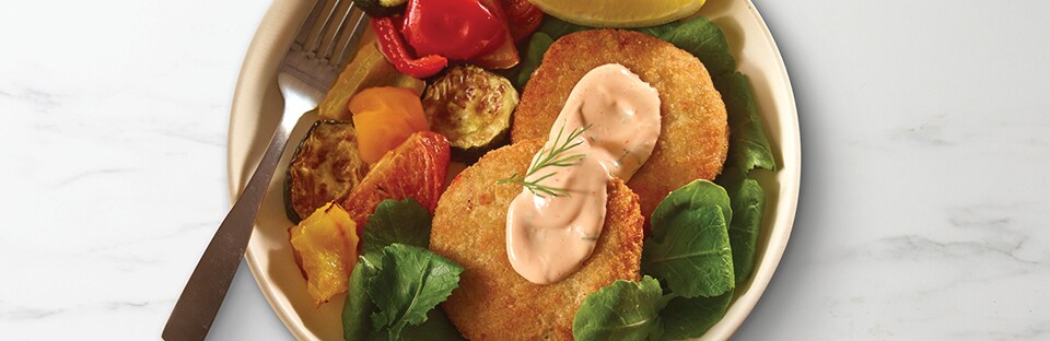 dinner plate of crab cakes