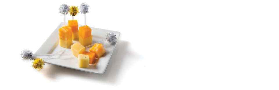 cheese cubes with pom pom toothpicks