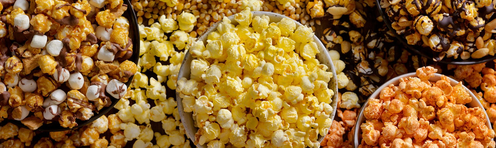 Buckets of flavored popcorn